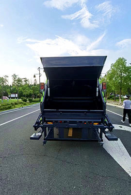 ISUZU चेसिस 10m3 कॉम्पैक्टर कचरा ट्रक कचरा बीन संग्रह डंप ट्रक 8 टन